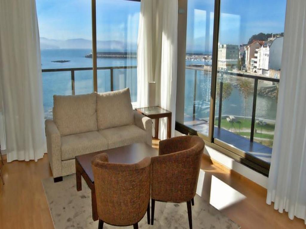 Apartamentos Turisticos Playa De Osmo Corme Экстерьер фото
