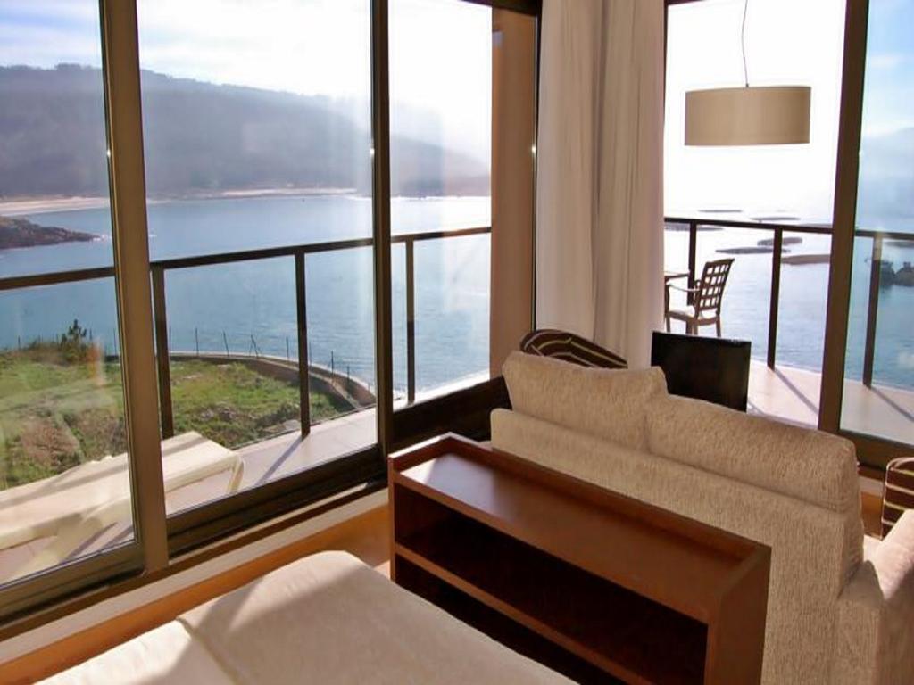 Apartamentos Turisticos Playa De Osmo Corme Экстерьер фото